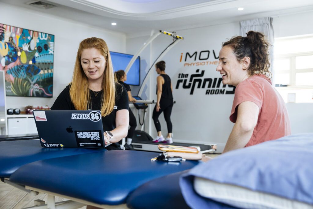 hysiotherapist conducting an initial osteoarthritis knee assessment at a Sydney clinic