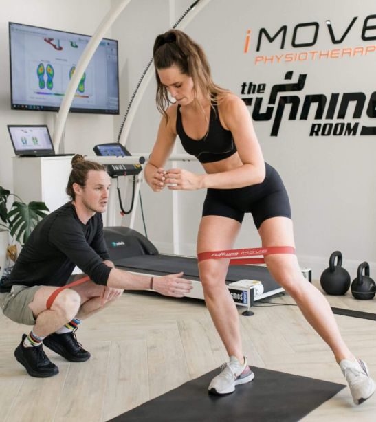iMove Physiotherapist treating marathon runner